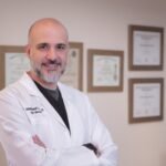 Dr. Omar Hamdallah vascular surgeon Jordan Hospital Amman consulting patient